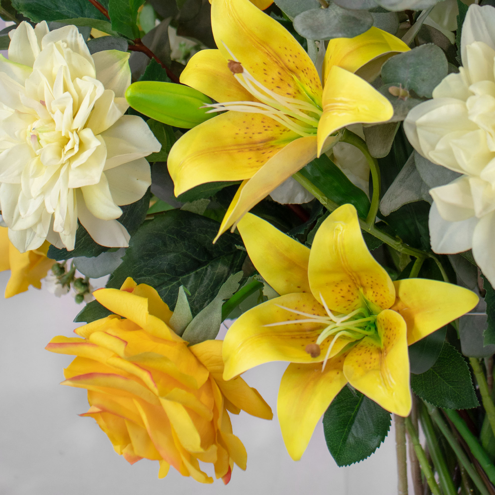 DELUXE MIXED YELLOW FLOWERS IN VASE