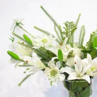 B461 LILY WHITE WITH SCABIOSA AND FOLIAGE IN CYLINDER VASE
