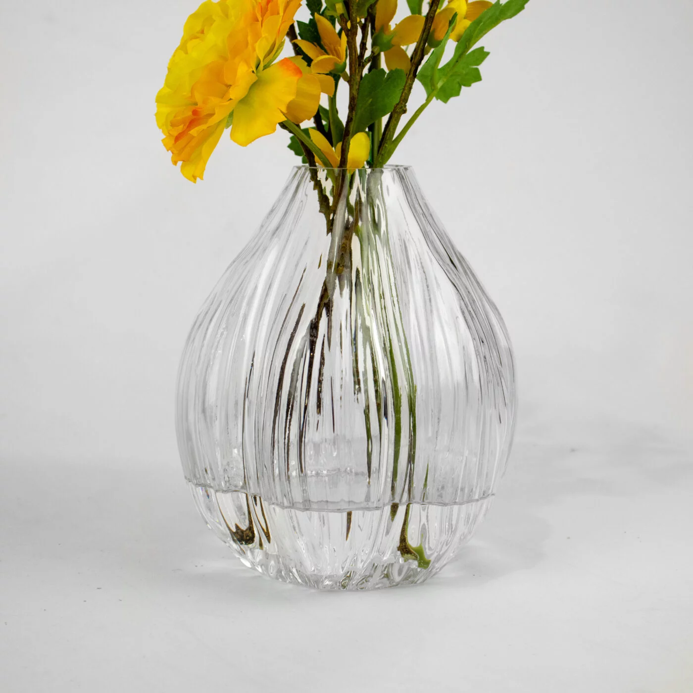 FORSYTHIA YELLOW WITH RANANCULUS YELLOW IN LG BUD VASE
