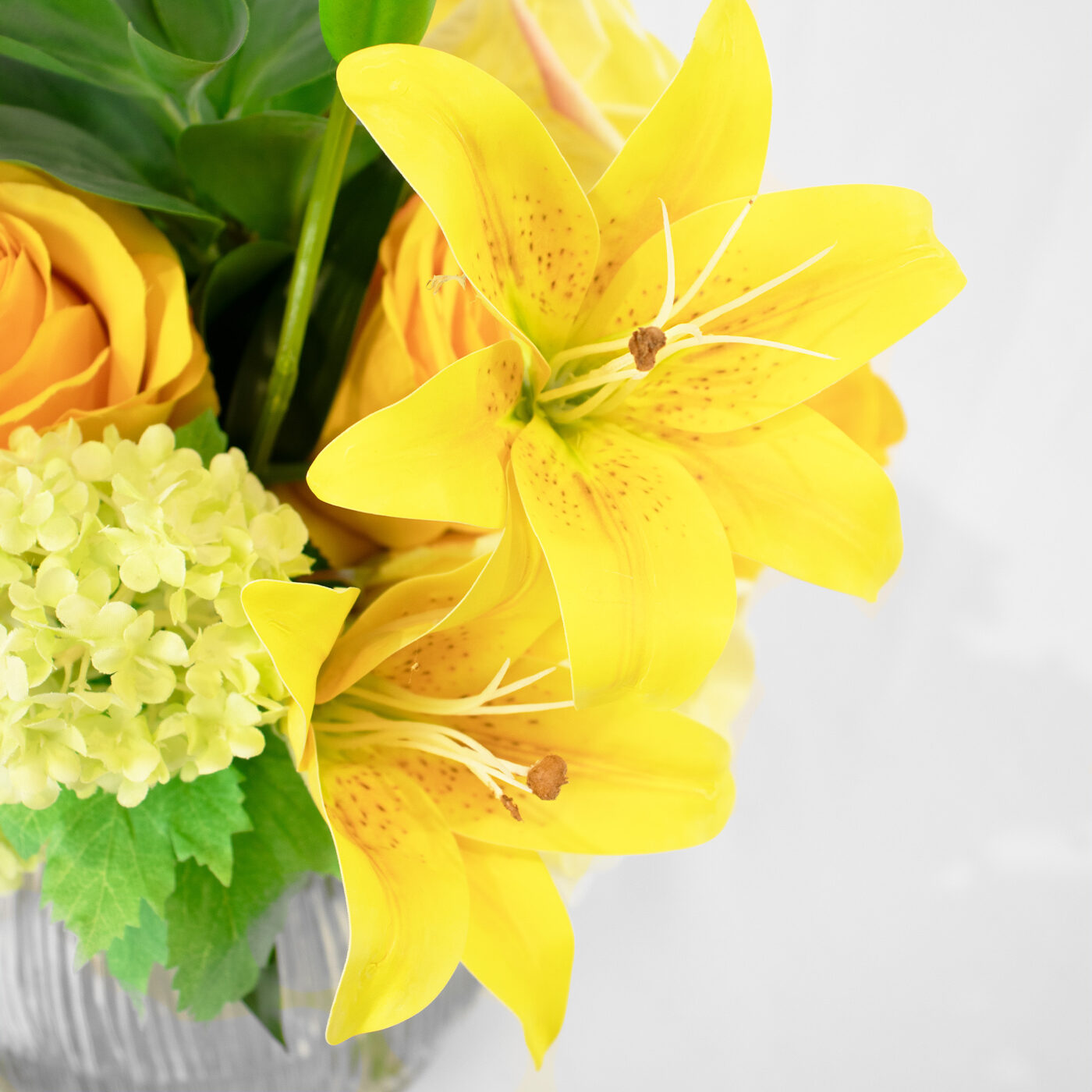 LILY AND ROSES YELLOW WITH SNOWBALL IN RIBBED VASE