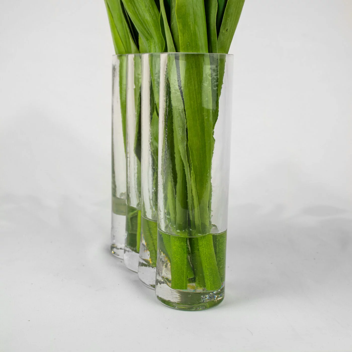TULIPS YELLOW AND PINK IN RECTANGULAR GLASS VASE