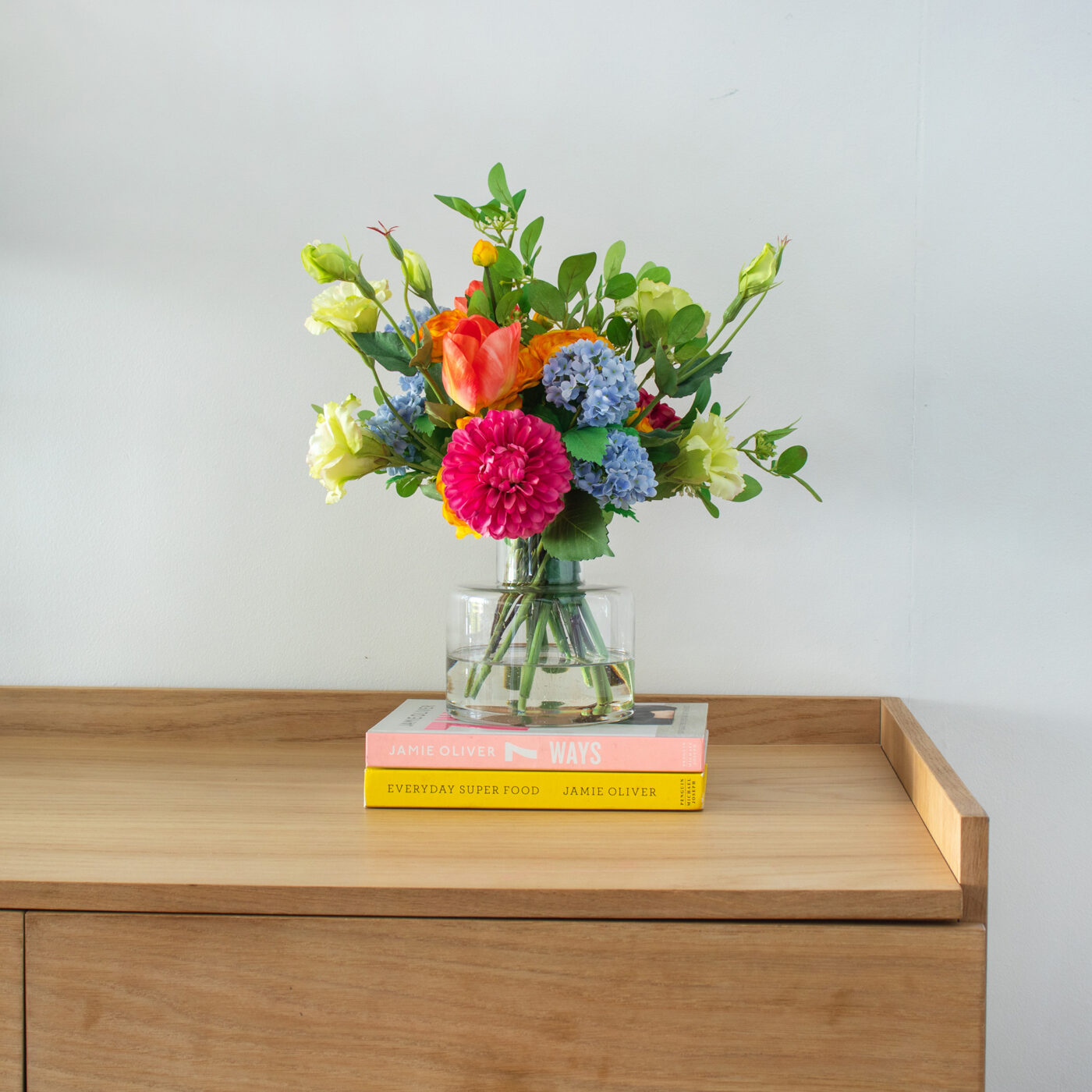 MIXED BUNCH BRIGHTS IN SMALL JAR VASE