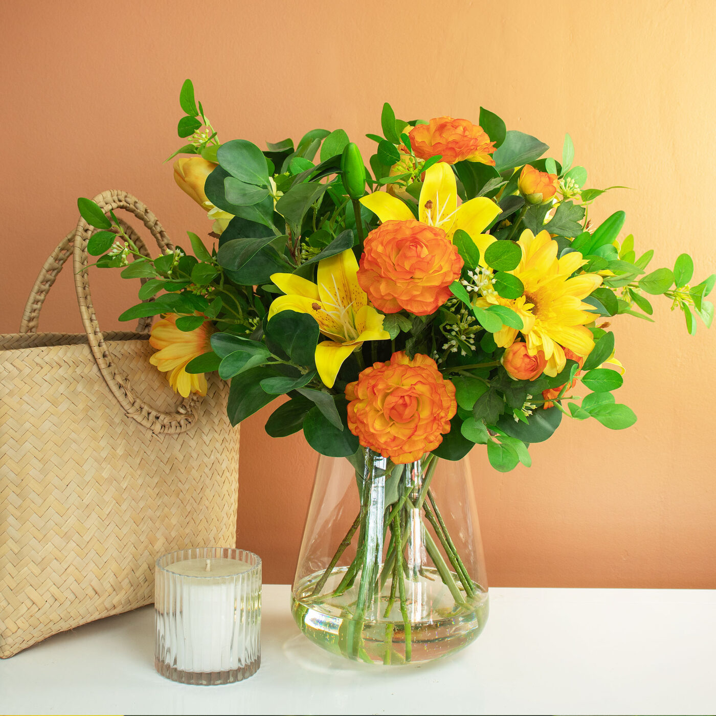 LILY RANUNCULUS ROSE ORANGE AND YELLOW IN GLASS VASE