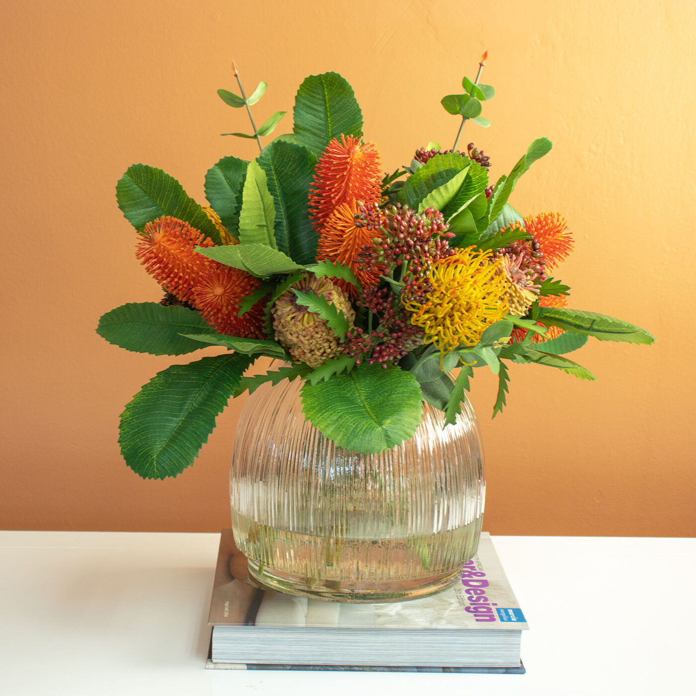 BANKSIA MIX WITH PROTEA IN RIBBED GLASS VASE