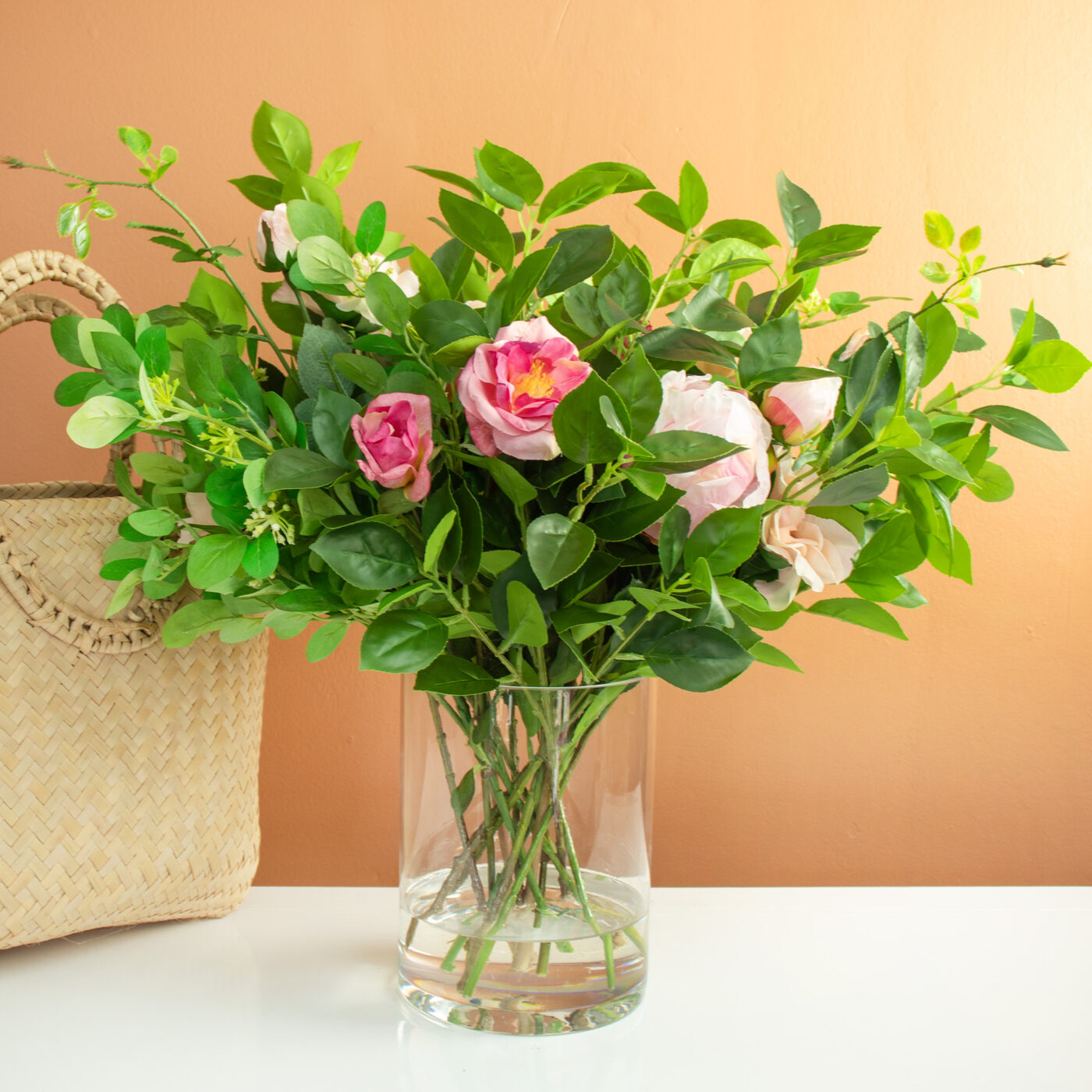 MIXED FOLIAGE WITH PINK PEONY AND ROSES