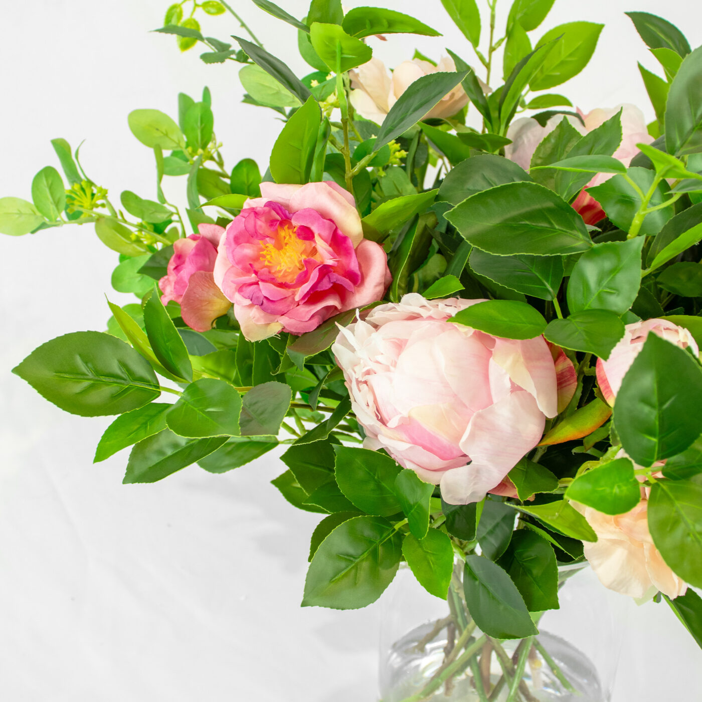 MIXED FOLIAGE WITH PINK PEONY AND ROSES