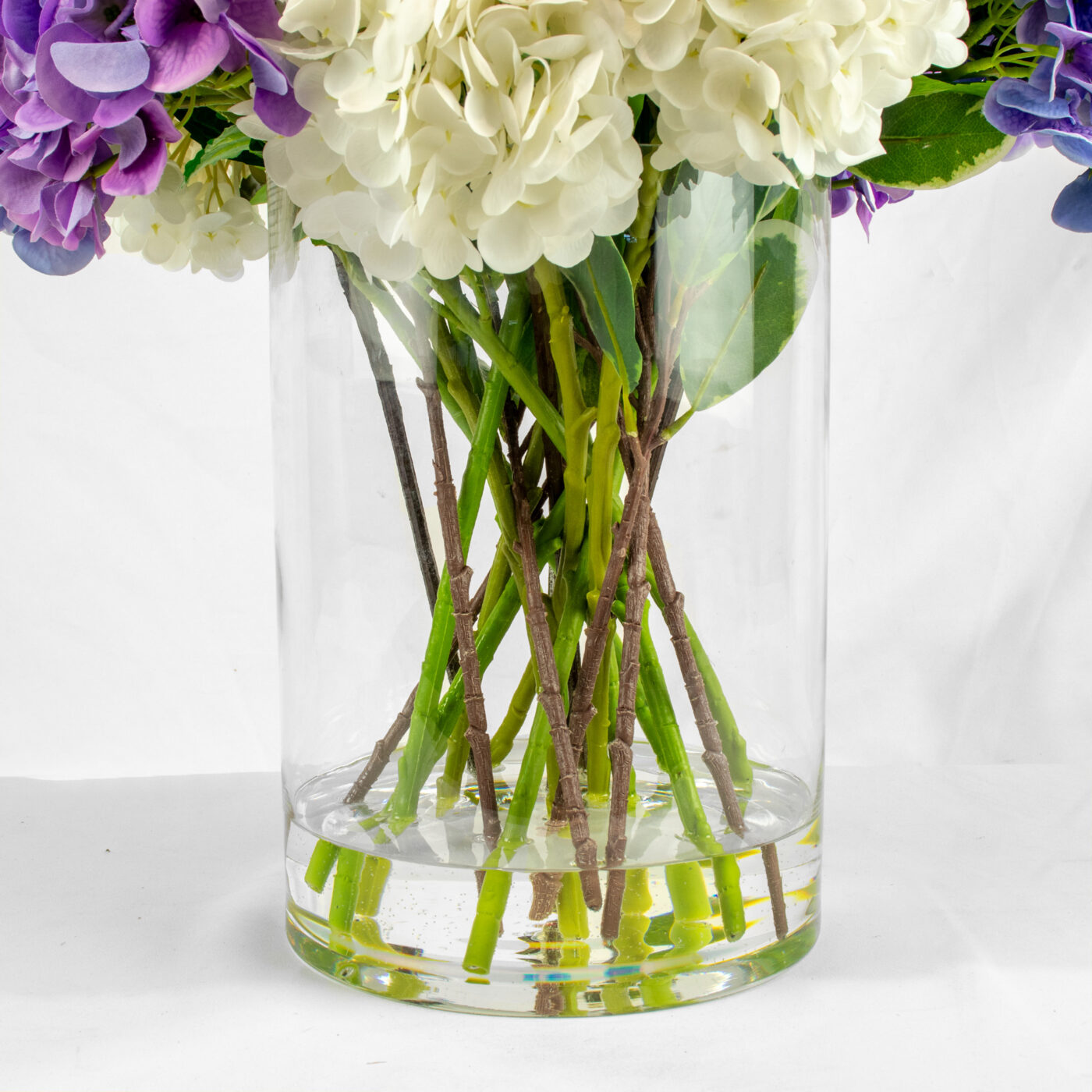 HYDRANGEA BLUE AND WHITE MIX IN LARGE CYLINDER VASE