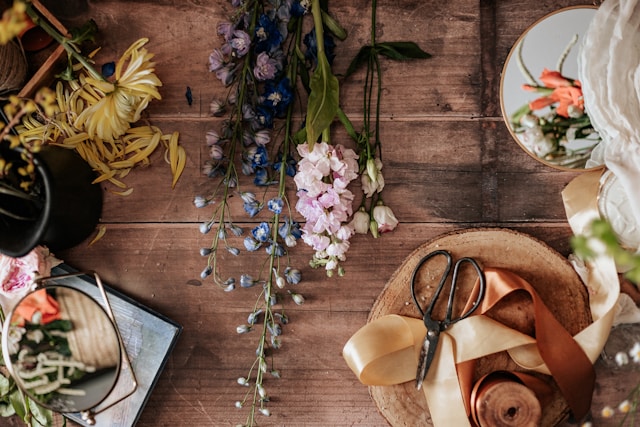 flower stems on a work bench - top down view