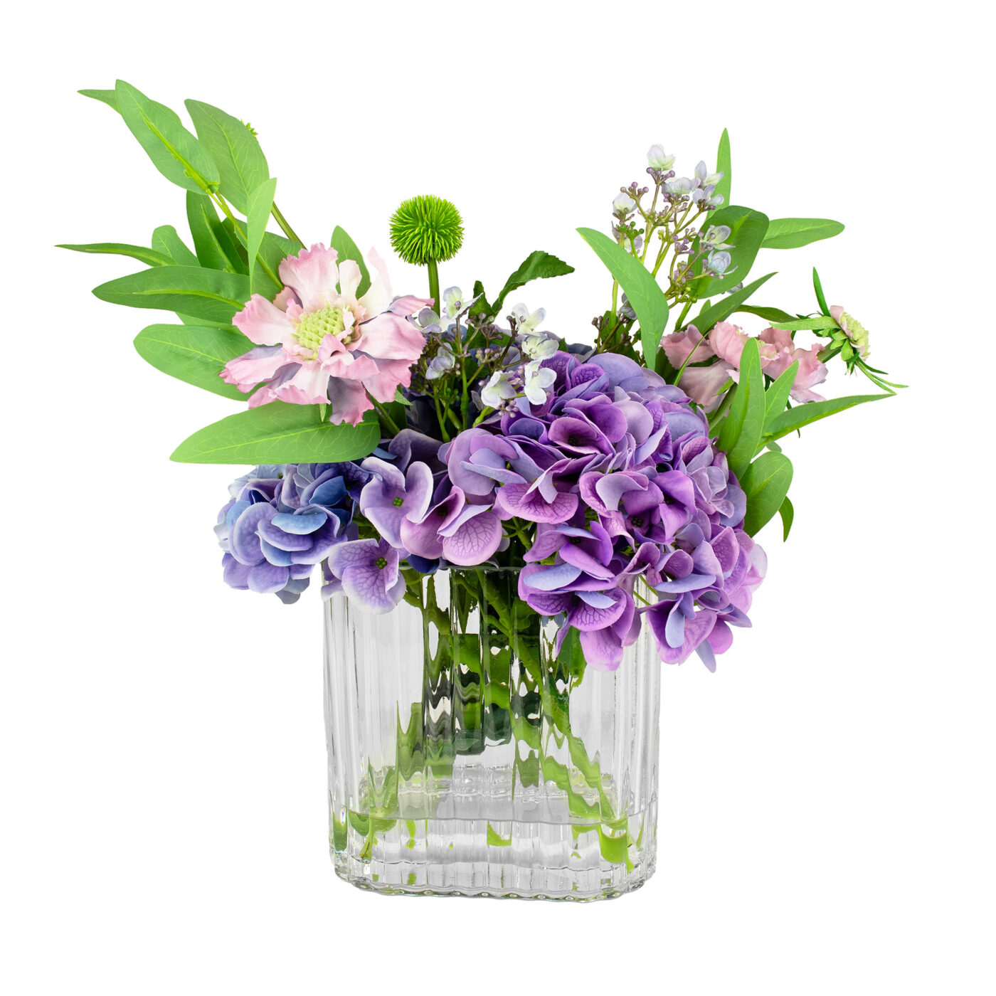 HYDRANGEA BLUE AND PURPLE WITH FOLIAGE IN RIBBED RECT VASE