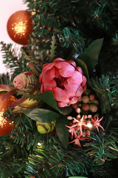 pink protea floral decorated xmas tree