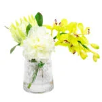 ORCHID PEONY AND PROTEA IN GLASS VASE