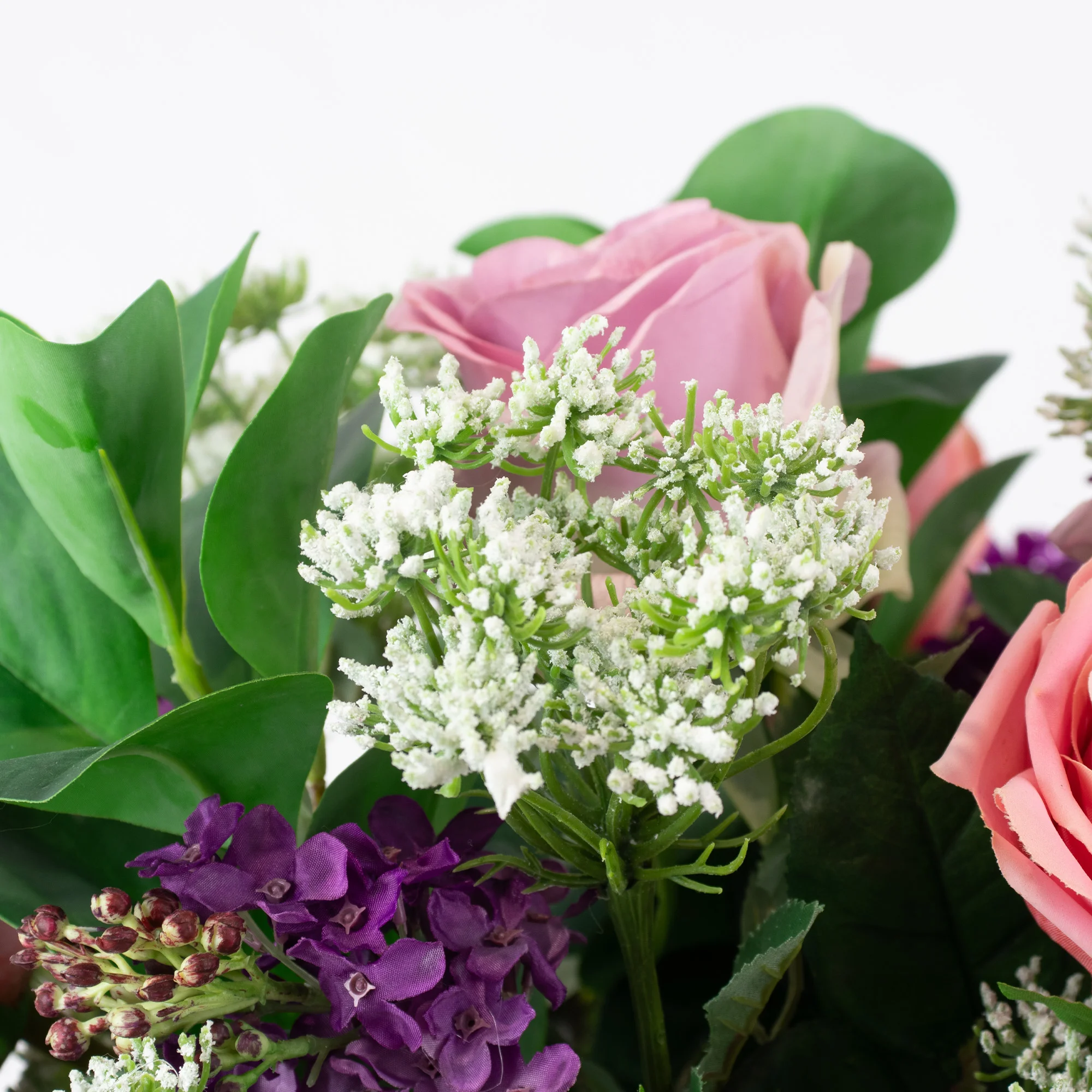 PURPLE, LAVENDER, REAL TOUCH ROSES WITH QUEEN ANNE LACE IN TULIP VASE