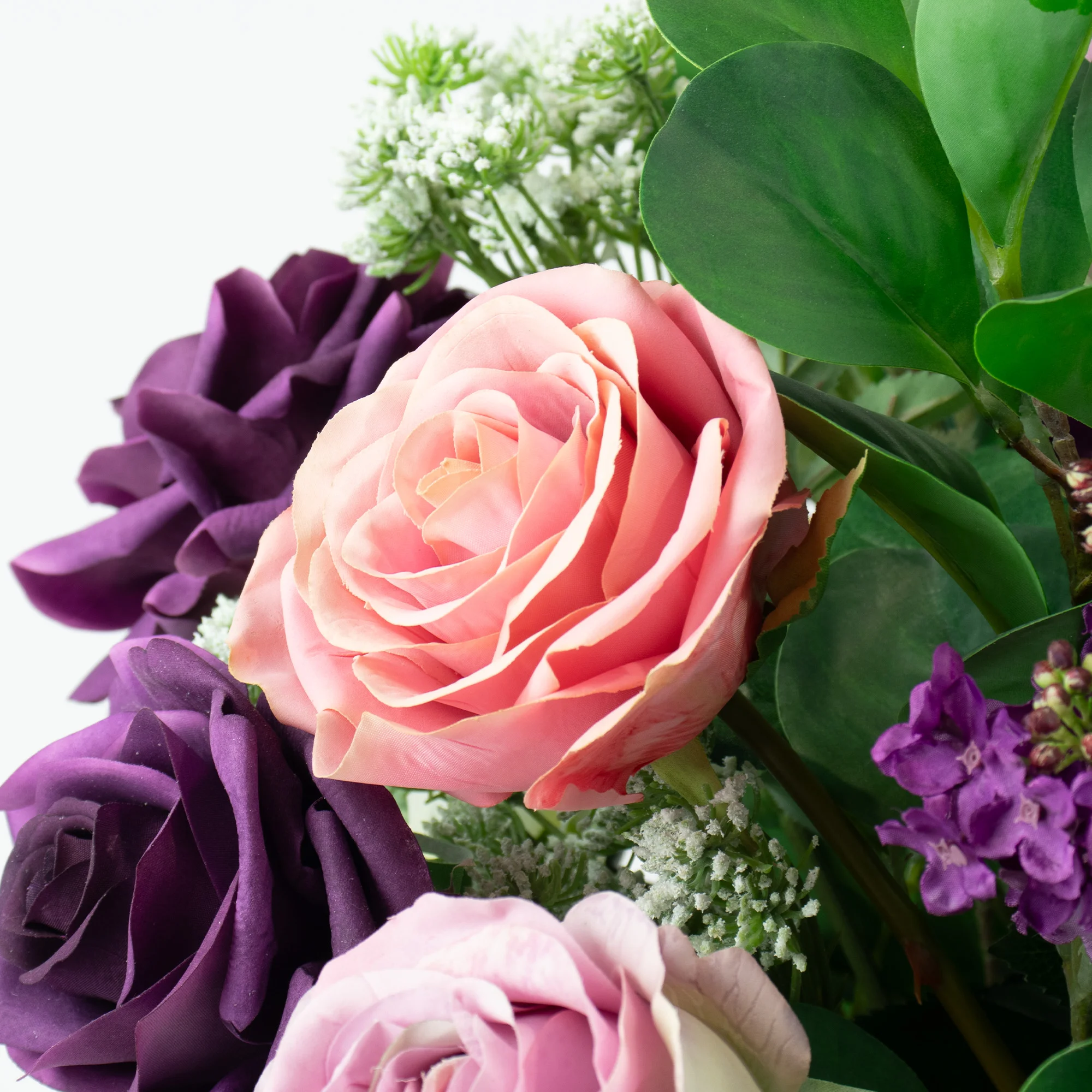 PURPLE, LAVENDER, REAL TOUCH ROSES WITH QUEEN ANNE LACE IN TULIP VASE