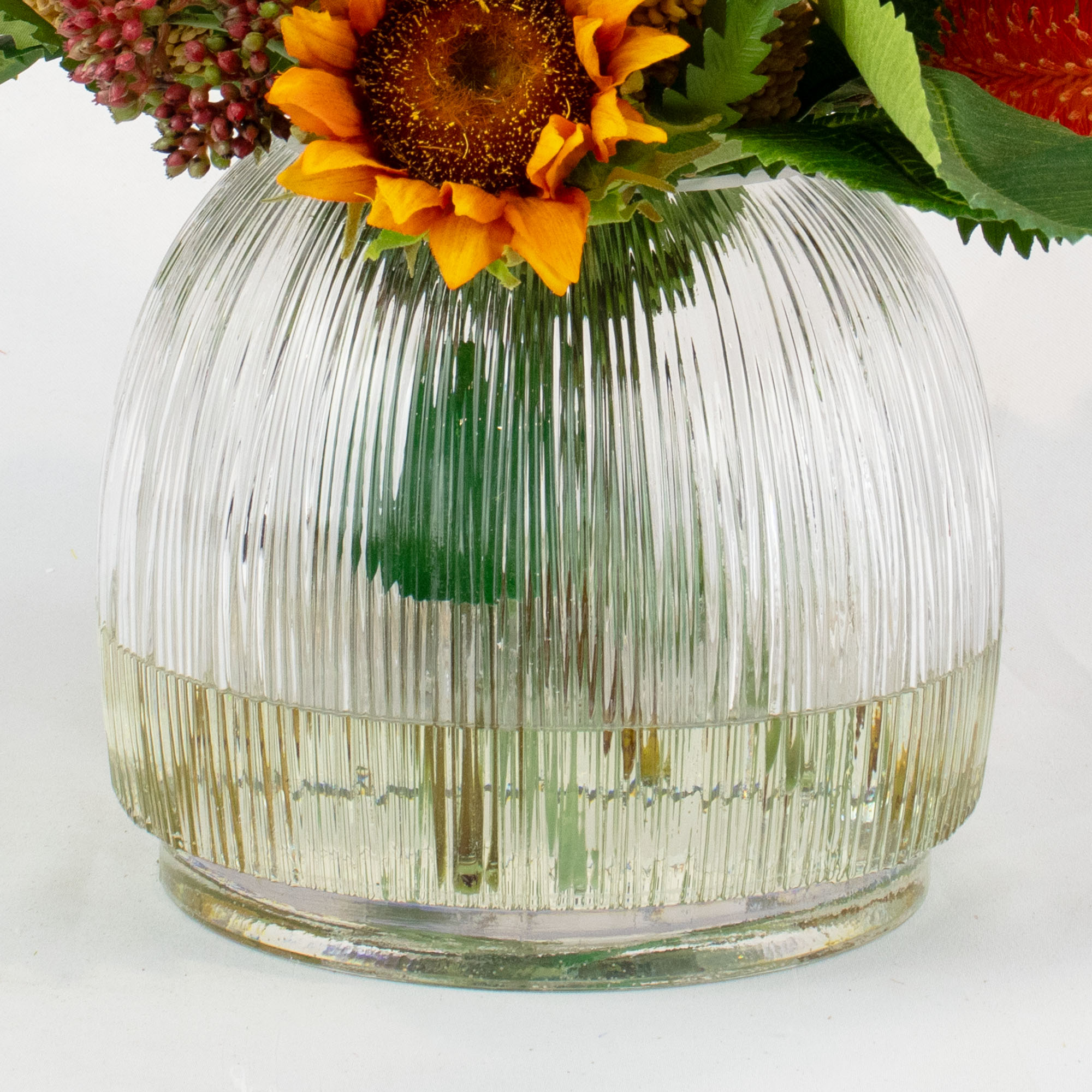 BANKSIA MIX WITH SUNFLOWER IN RIBBED GLASS VASE