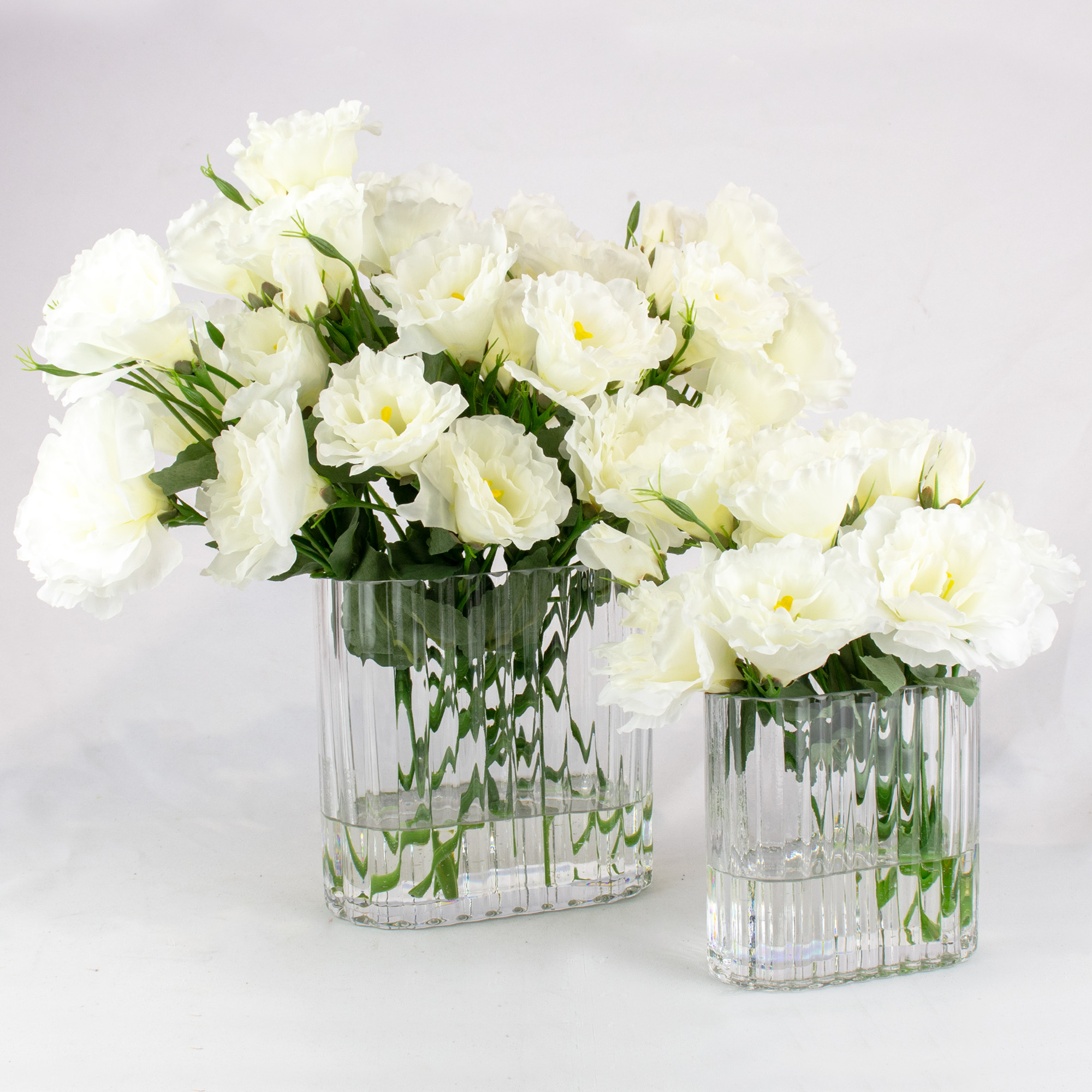 WHITE LISIANTHUS IN RIBBED LARGE OBLONG VASE