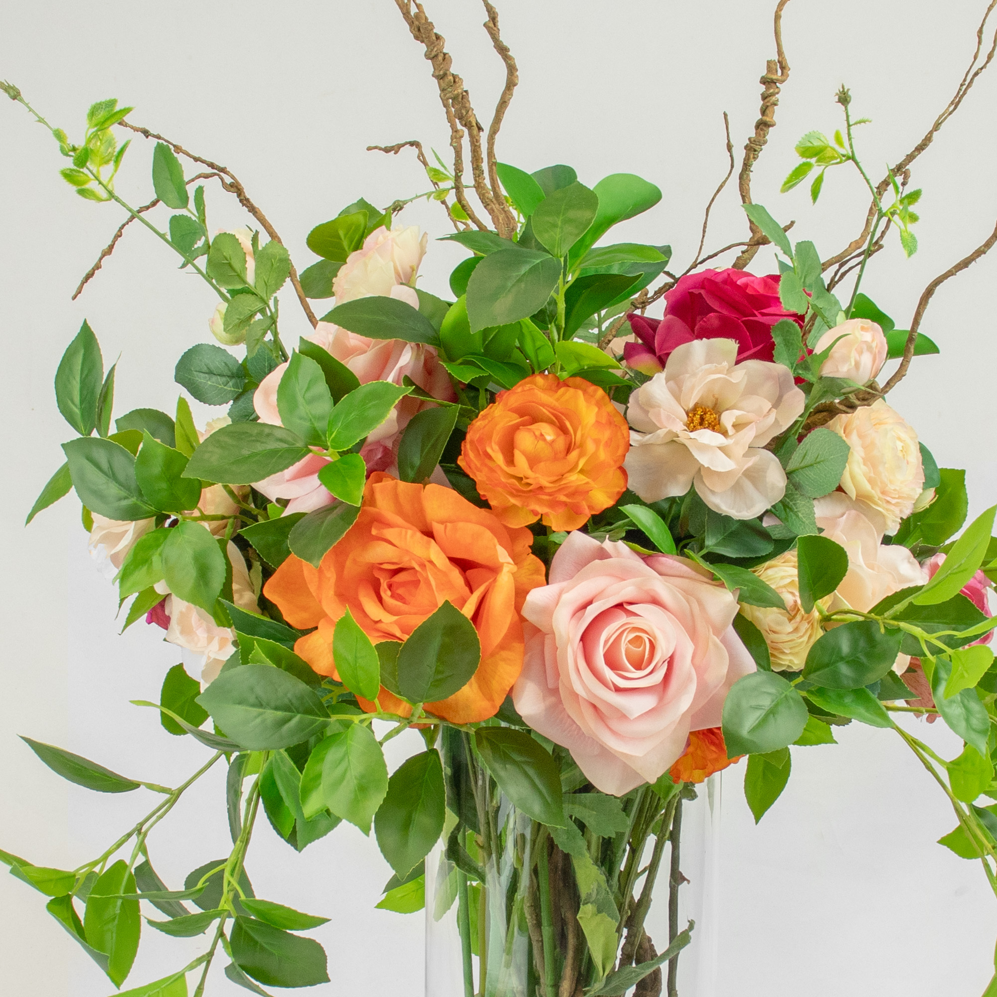 GARDEN MIX ROSES AND FOLIAGE IN CYLINDER VASE