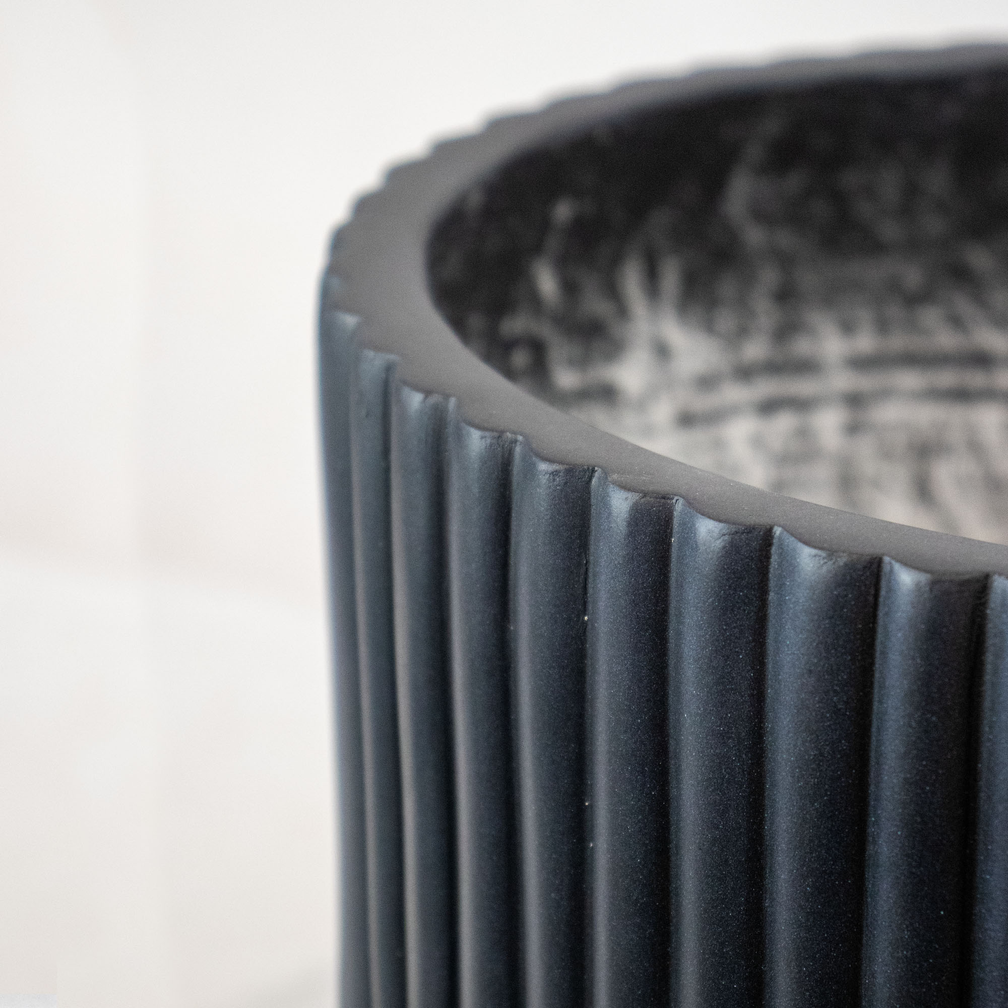 Large Black Ribbed Fibre Cement Footed Planter