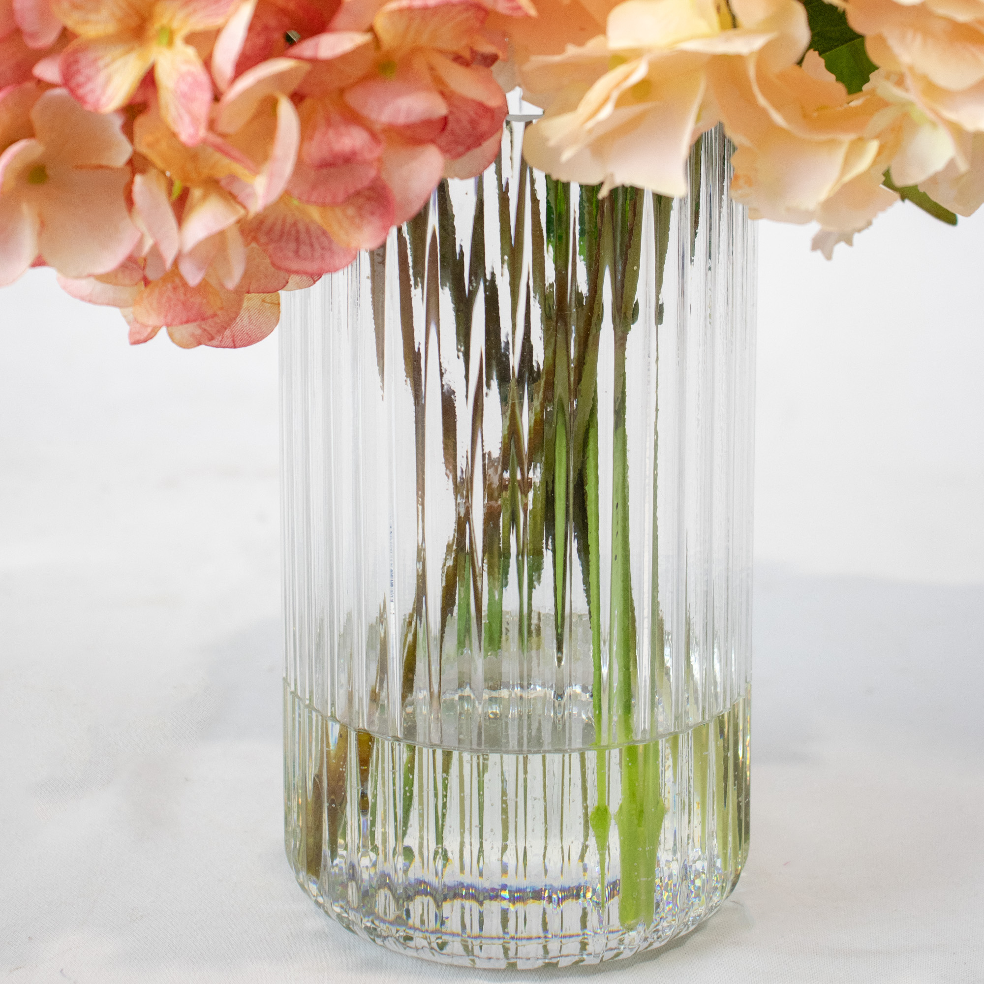 PINK & PURPLE HYDRANGEA MIX IN SML RIBBED CYL VASE