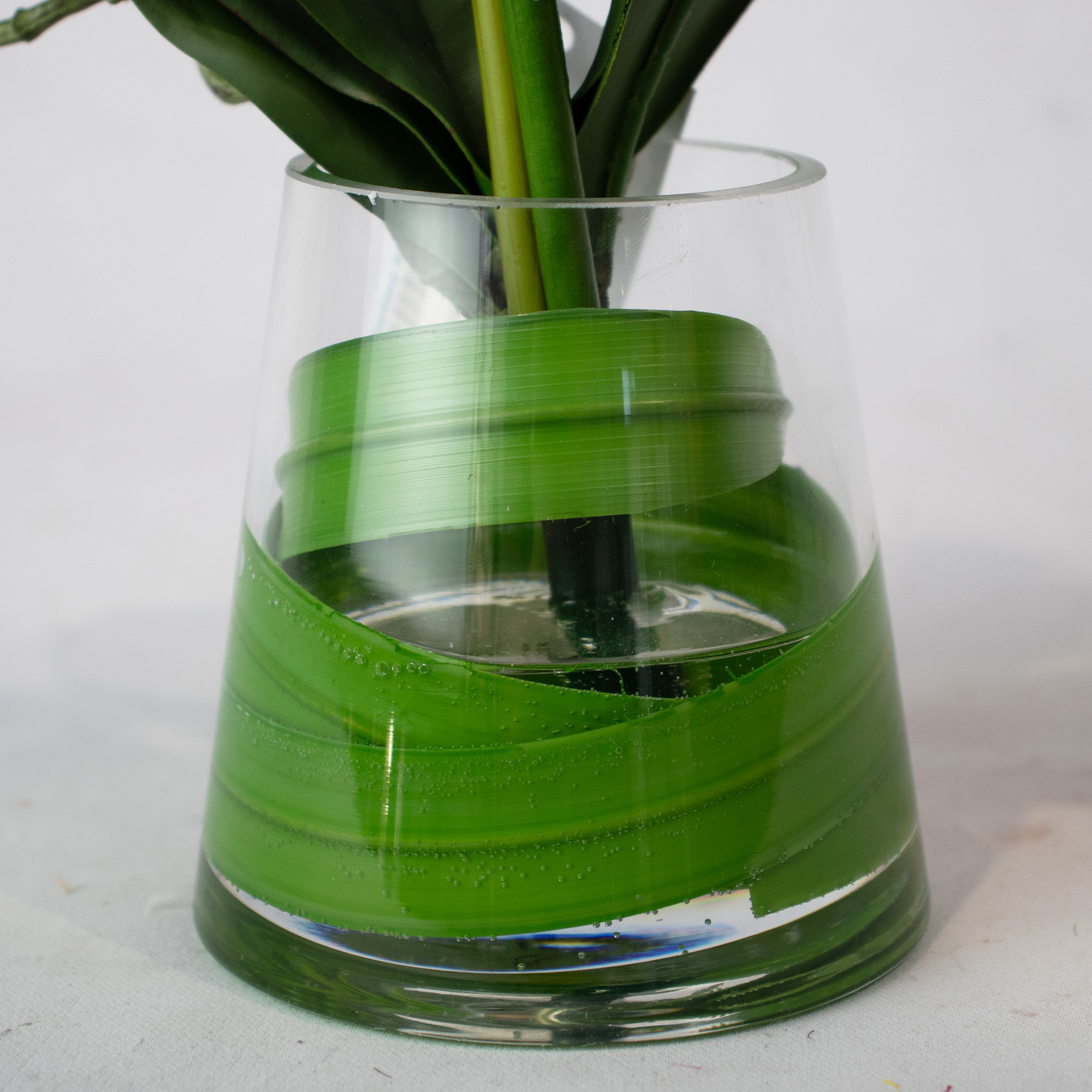 Gold Phalaenopsis Orchid In Small leaf wrapped Tapered Vase