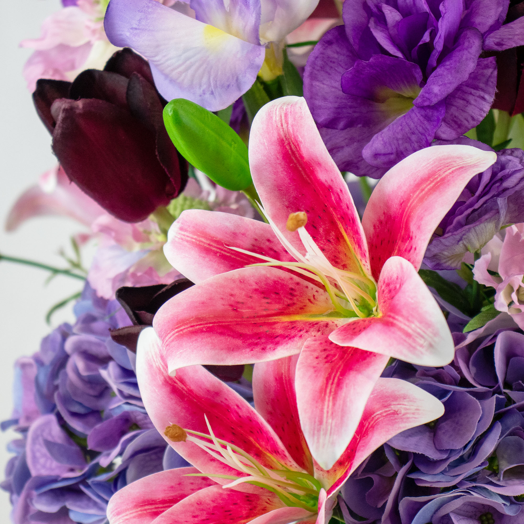 PINK TIGER LILY WITH PURPLE HYDRANGEA IN TAPERED VASE