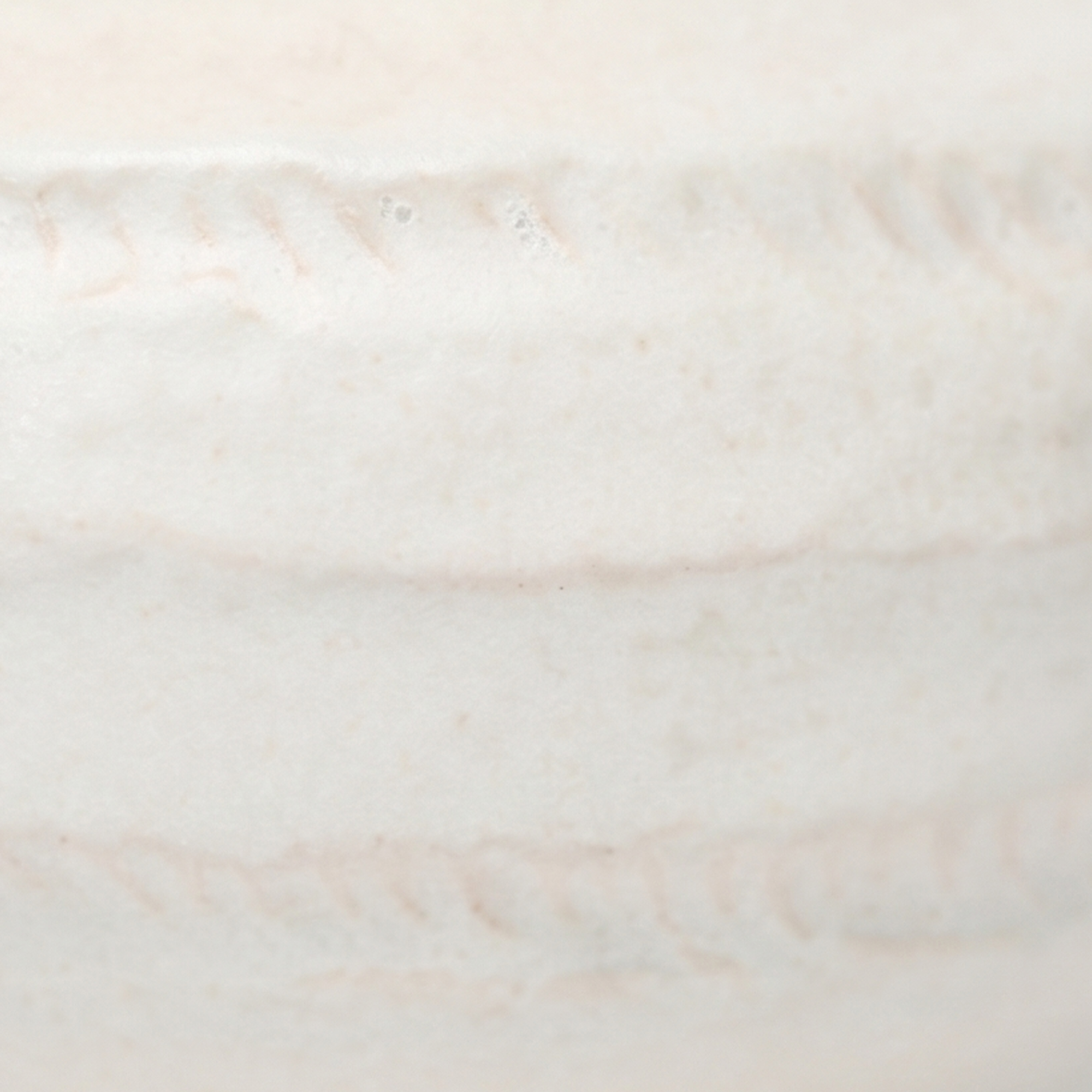 Medium 18.7cm organic gourd off-white ceramic vase with a ribbed texture styled on a wooden dining room sideboard.