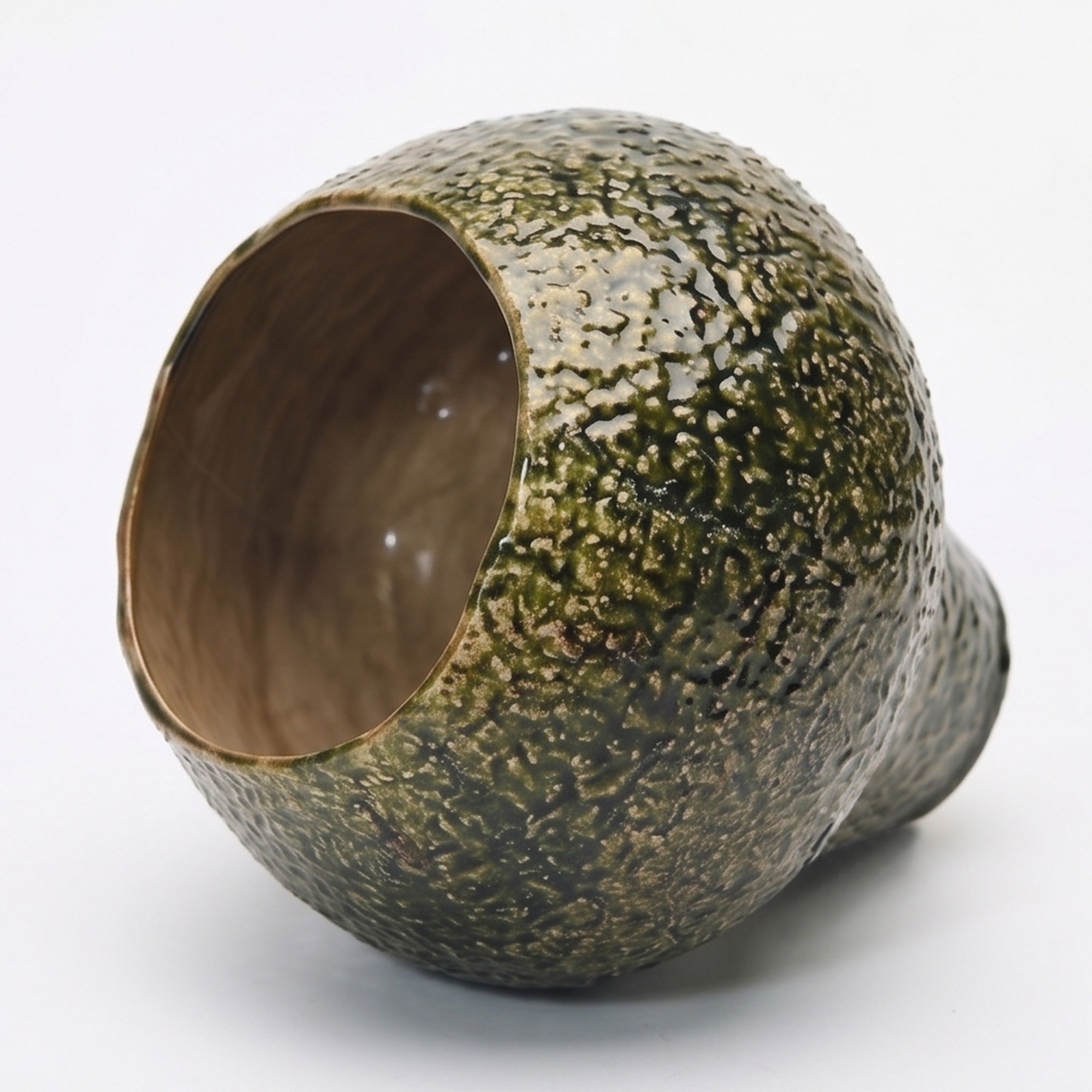 Large 23.5cm textured moss green ceramic pedestal bowl vase with a glossy glaze styled on a wooden dining room sideboard.
