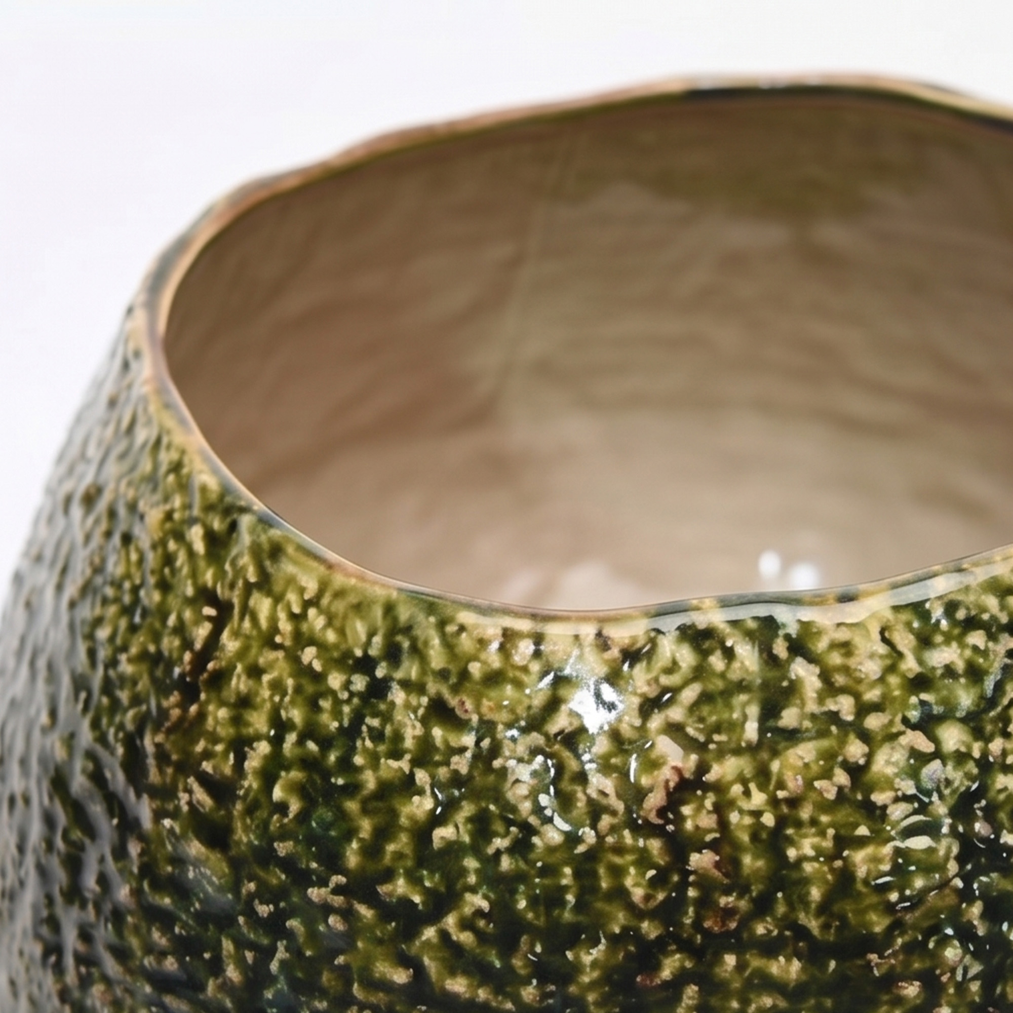 Extra large 31.5cm textured moss green ceramic pedestal bowl vase with a glossy glaze styled on a wooden dining room sideboard.
