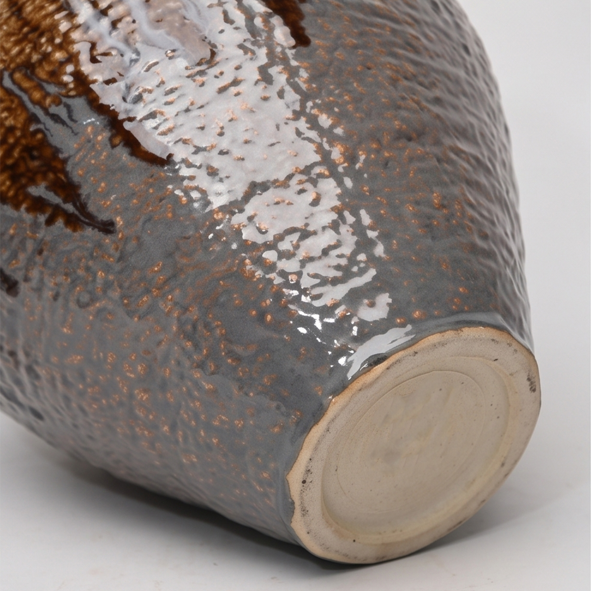 Extra extra large 52.5cm cream brown ceramic jar with a textured drip glaze styled on a wooden dining room sideboard.