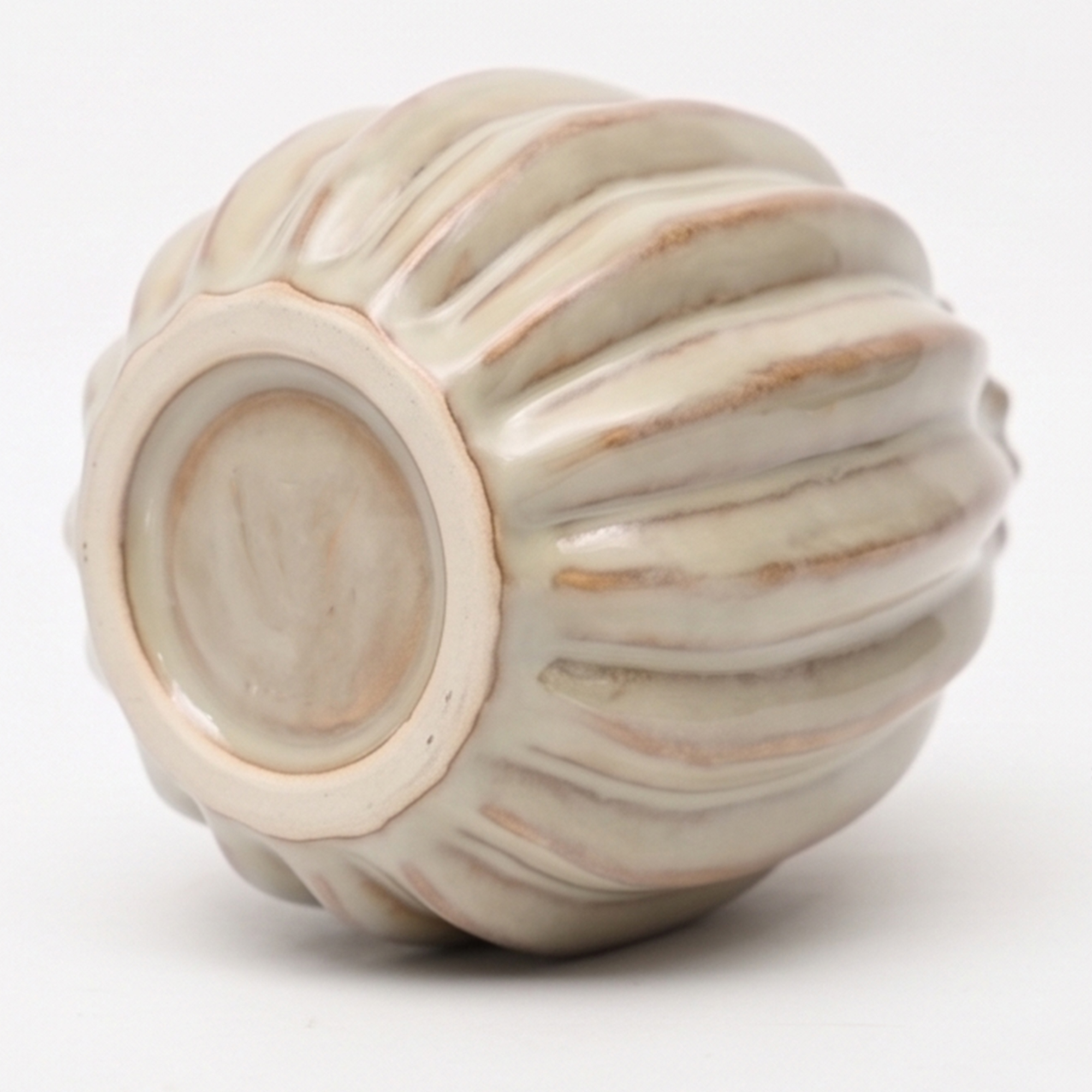 Medium 17.2cm ribbed cream ceramic bud vase with a glossy glaze styled on a wooden dining room sideboard.