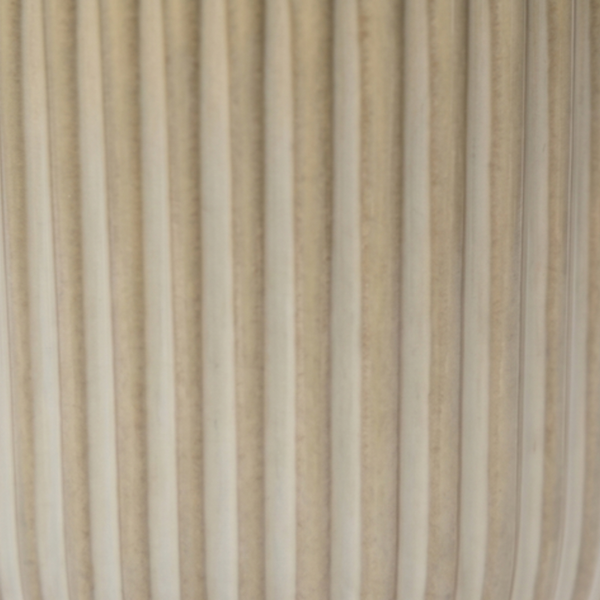 extra-small 10.5cm ribbed cream ceramic planter with a rounded base and vertical ribbing styled on a wooden dining room sideboard.