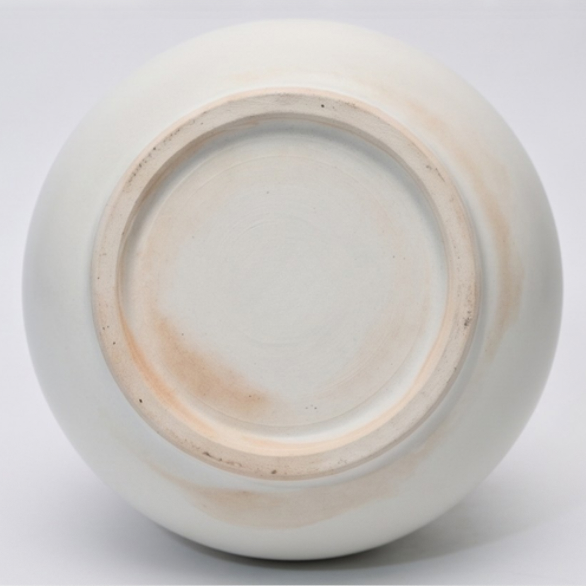 Large 24.5cm classic white ceramic ball vase with a smooth matte finish styled on a wooden dining room sideboard.