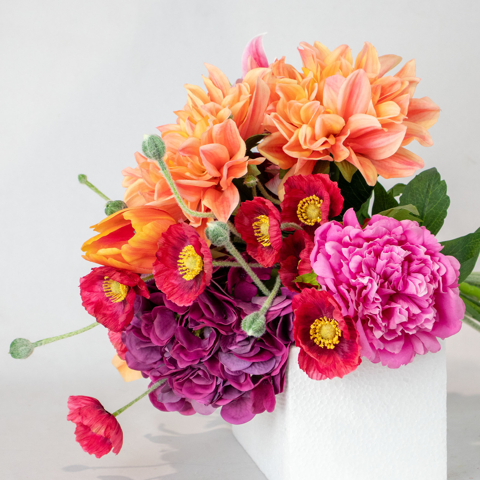 Pink and Orange Medium Silk By Design Mixed Floral Tied Bunch in Raffia Tie – 9 Stems