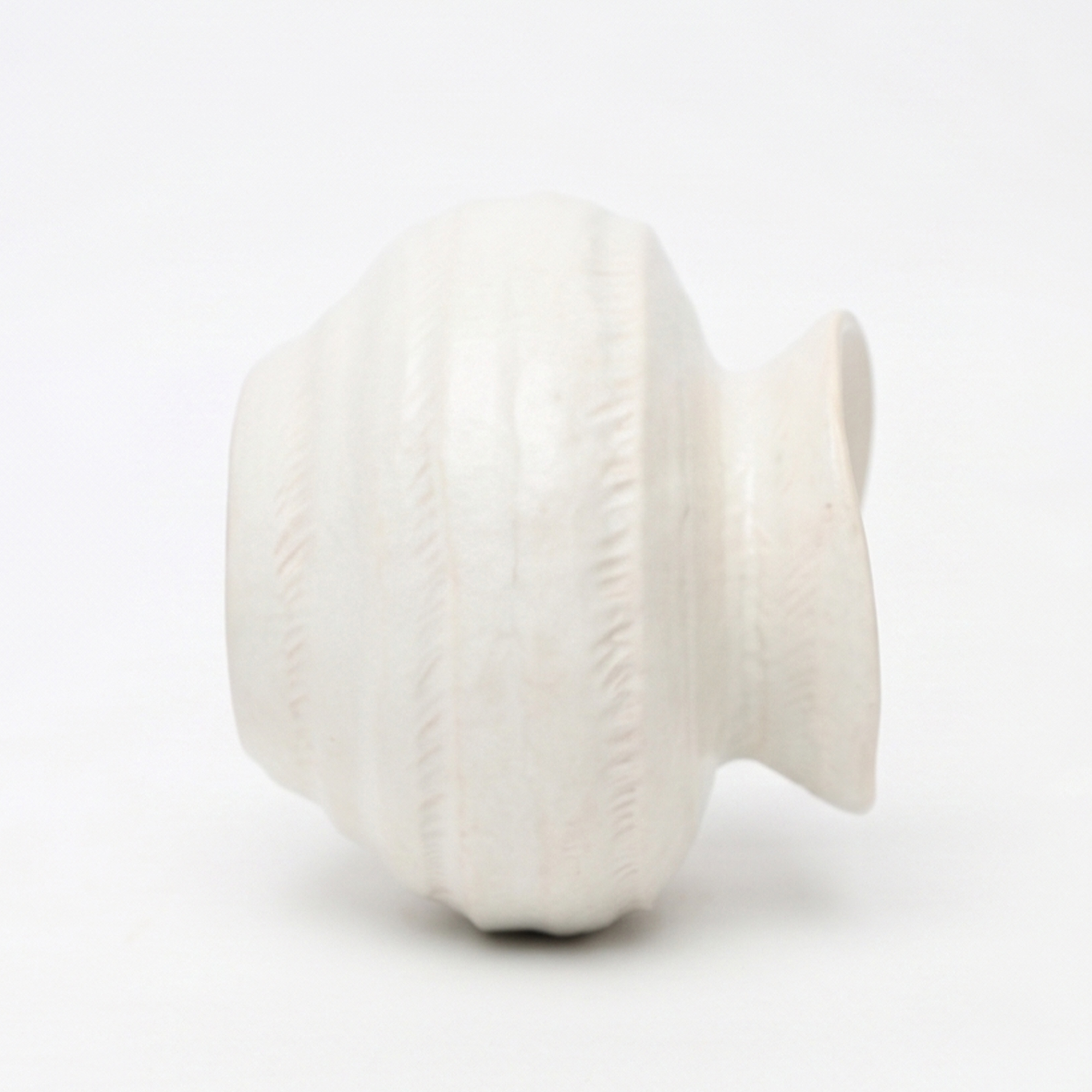 Medium 18.7cm organic gourd off-white ceramic vase with a ribbed texture styled on a wooden dining room sideboard.